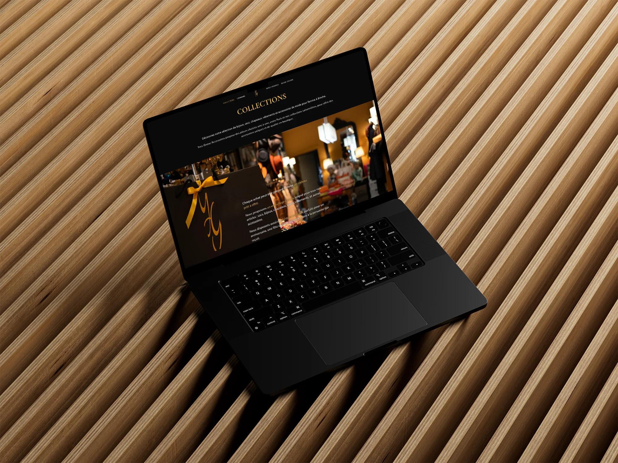 Mockup de MacBook M3 noir ouvert, affichant le design de la page d'accueil du site Yves Groise.